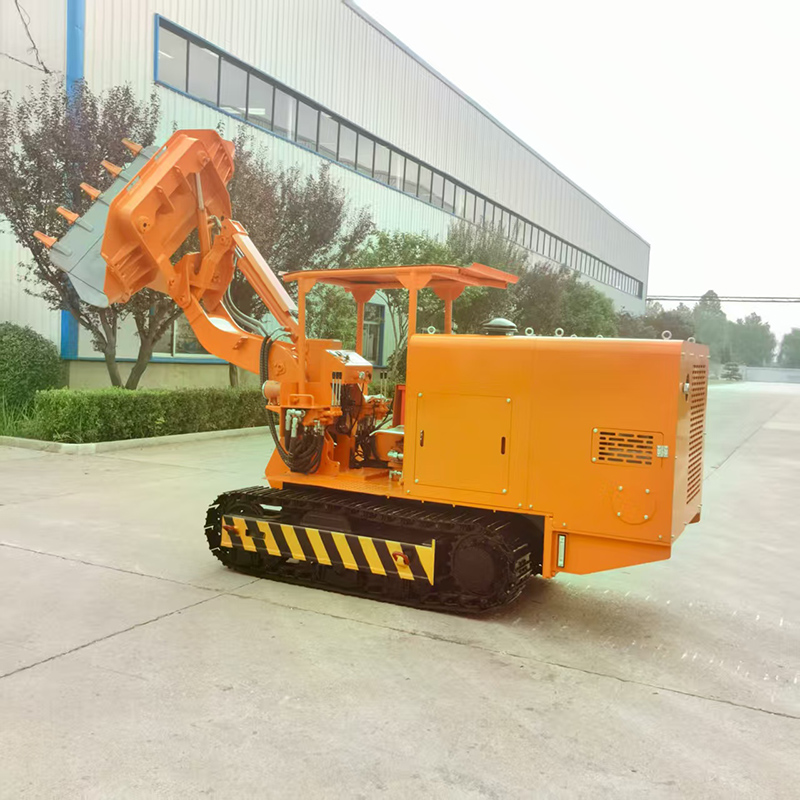 Carregadora de rochas com descarga lateral sobre rastos