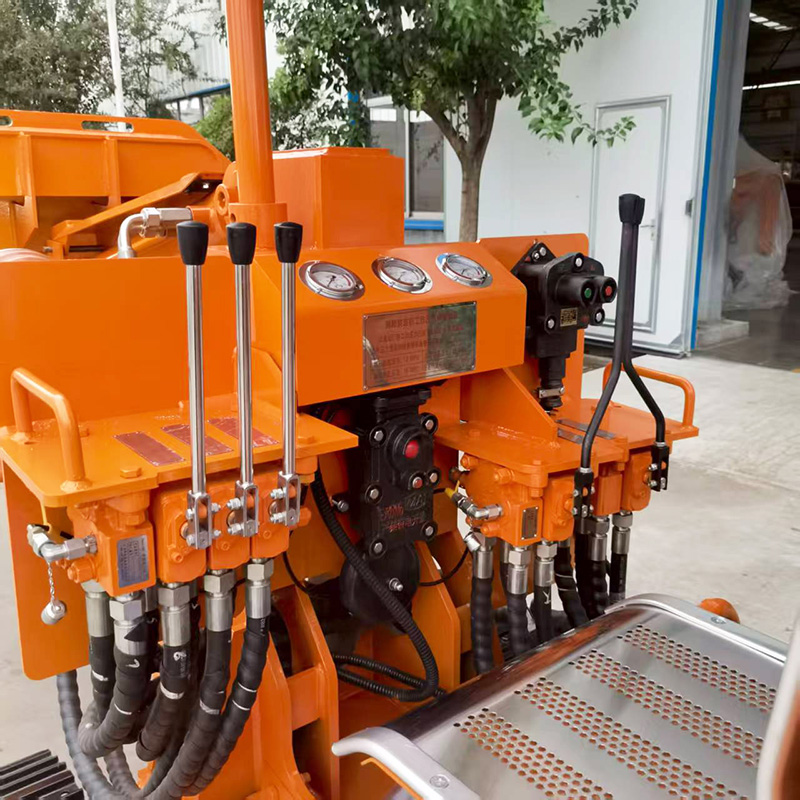 Carregador de rocha com descarga lateral ZCY