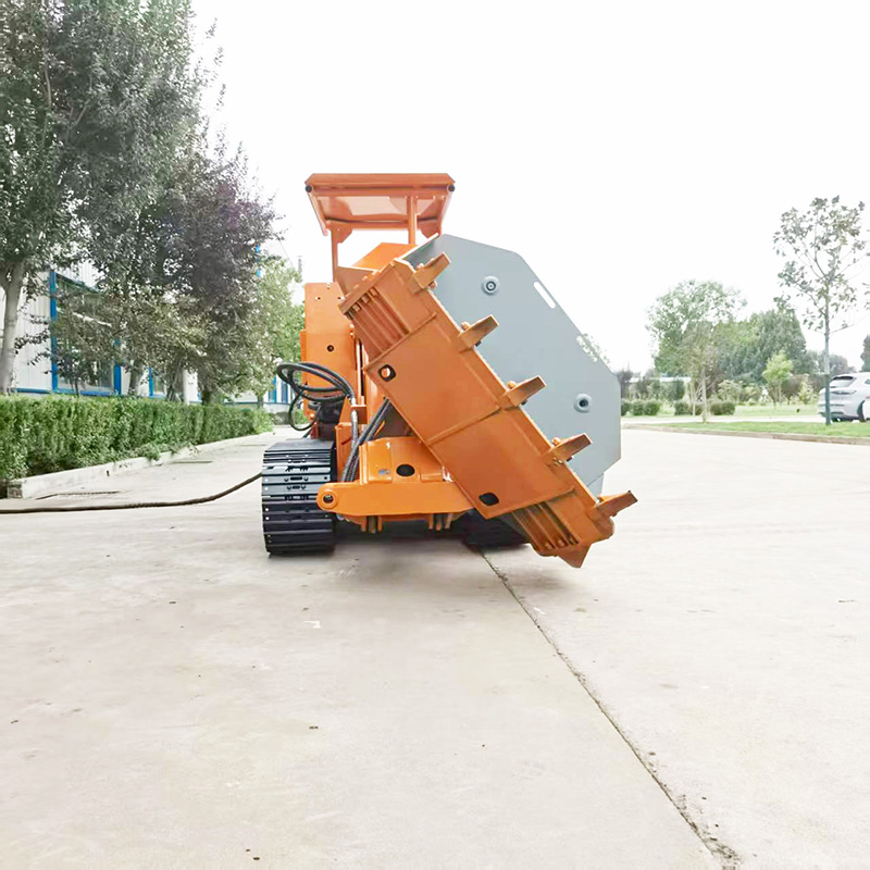 Cargador de rocas de gran capacidad con volquete lateral